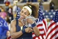 Serena Williams poses with the 2012 US Open trophy